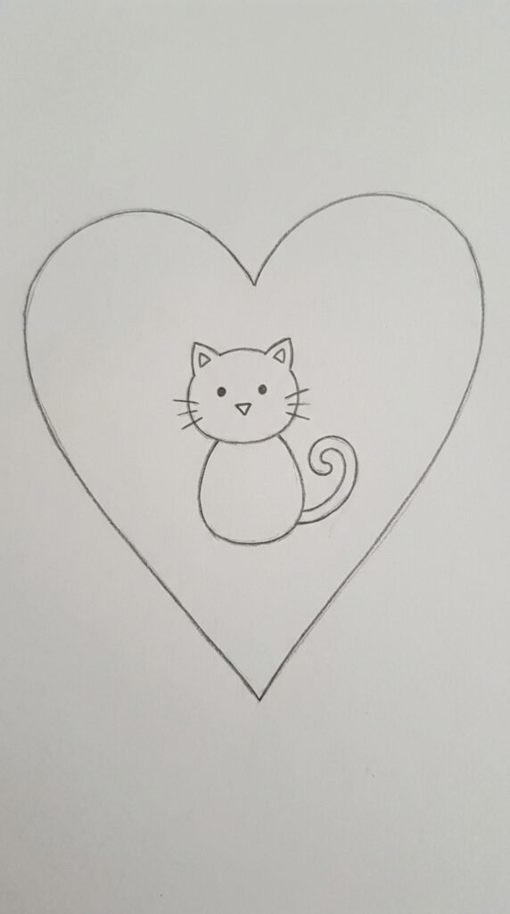 Simple pencil drawing of a cute cat sitting inside a heart shape, easy love sketch idea for beginners.