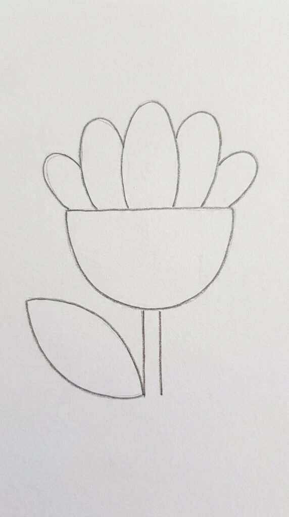 Simple lotus flower for kids pencil drawing with rounded petals and a leaf on white paper.