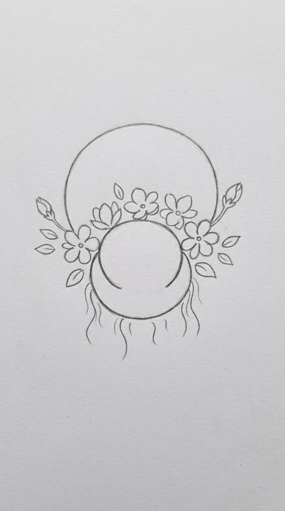  Pencil drawing of a hair bun decorated with a cluster of mogra jasmine flowers and leaves, shown in a simple child-friendly style on white paper.