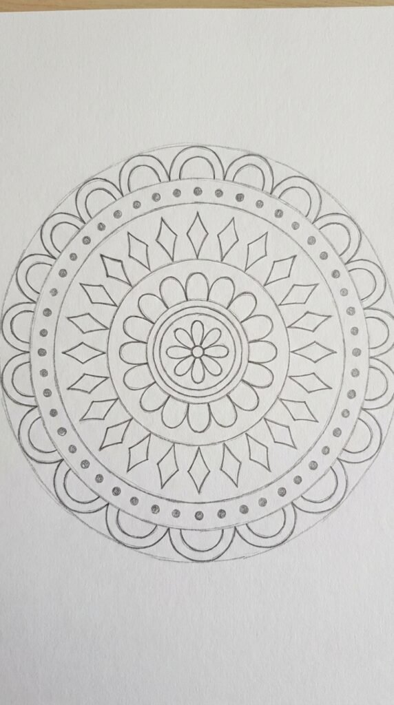 Easy psychedelic flower mandala trippy drawing for kids with repeating petal and dot patterns on white paper.