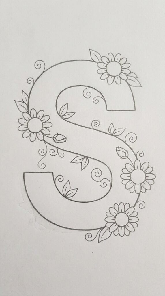 Pencil drawing of a decorative letter S with small sunflowers, leaves, and vines growing along the curves on white paper.