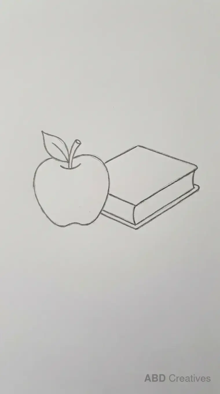 Apple Beside a Book