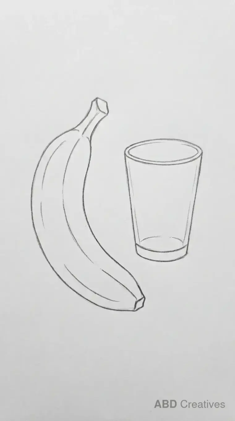 Banana Beside a Glass