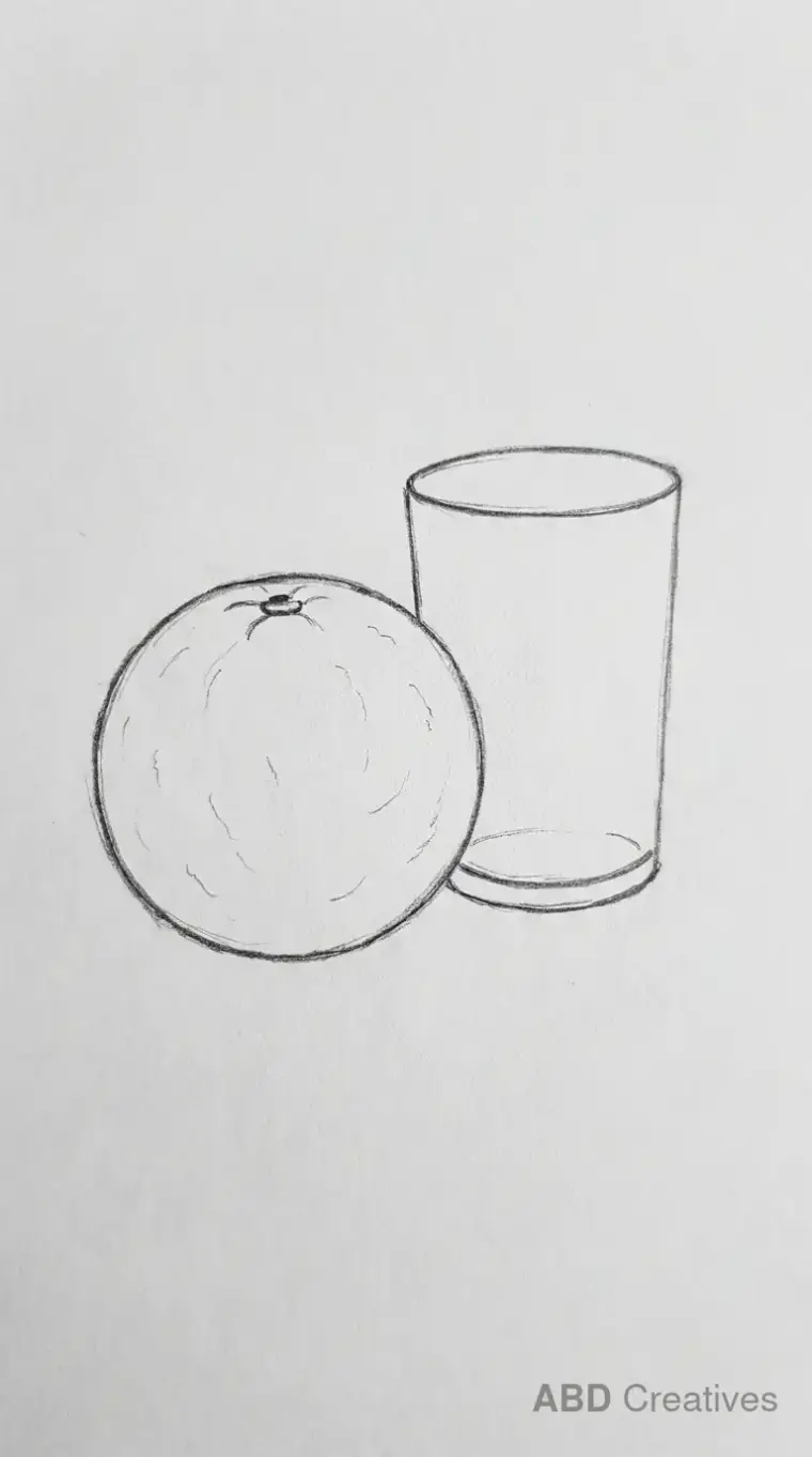 Orange Beside a Glass