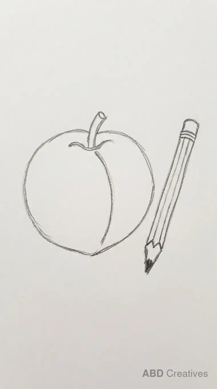 Peach Beside a Pencil