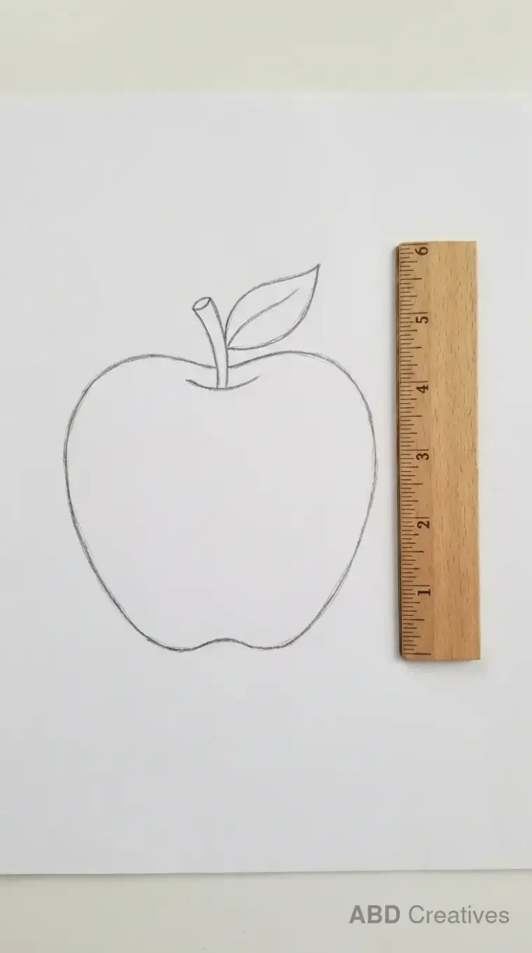 Apple Beside a Ruler