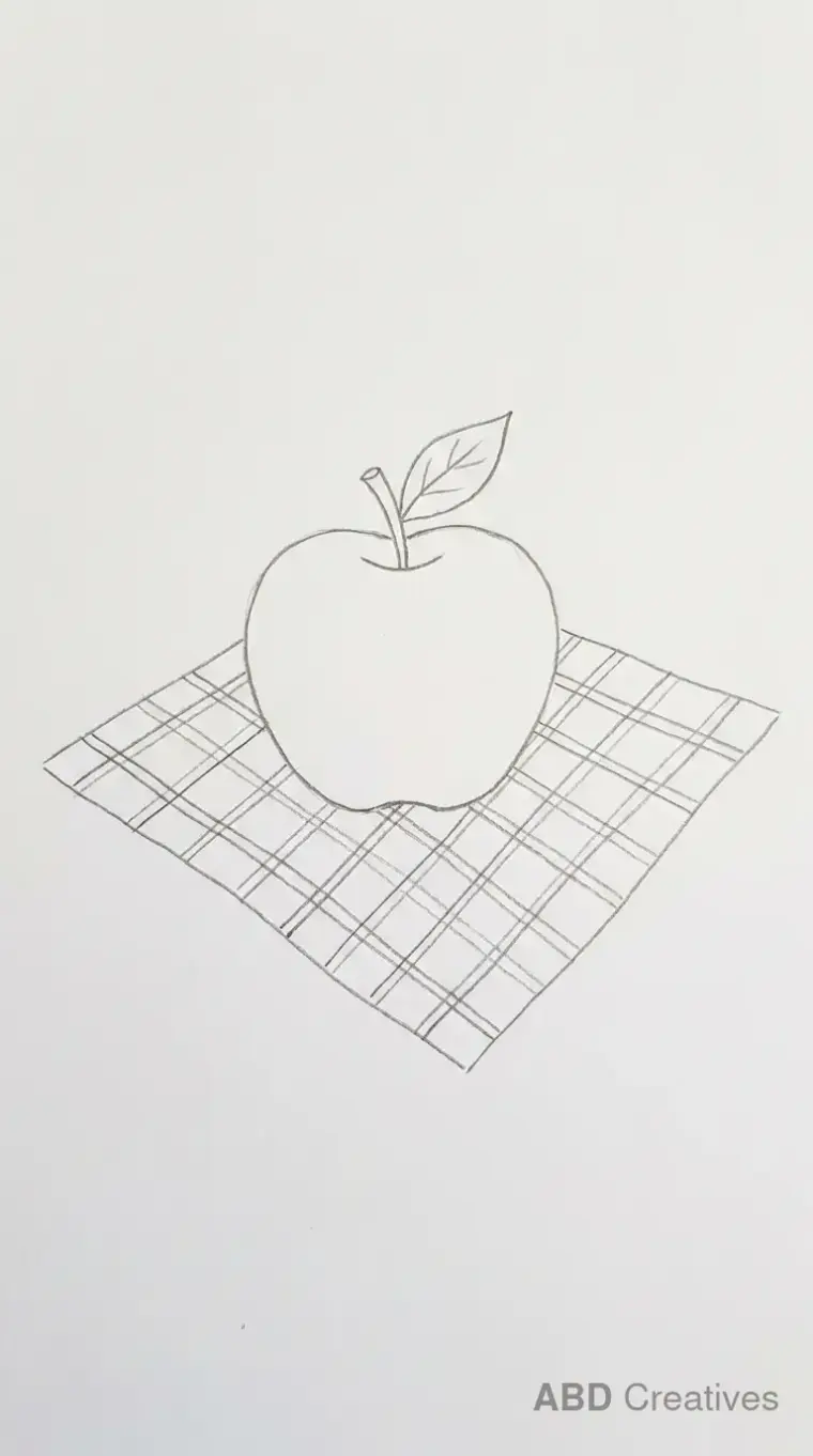 Apple Beside a Picnic Cloth