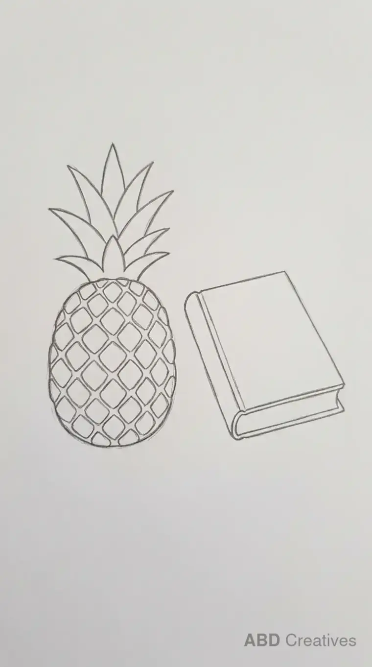 Pineapple Beside a Book