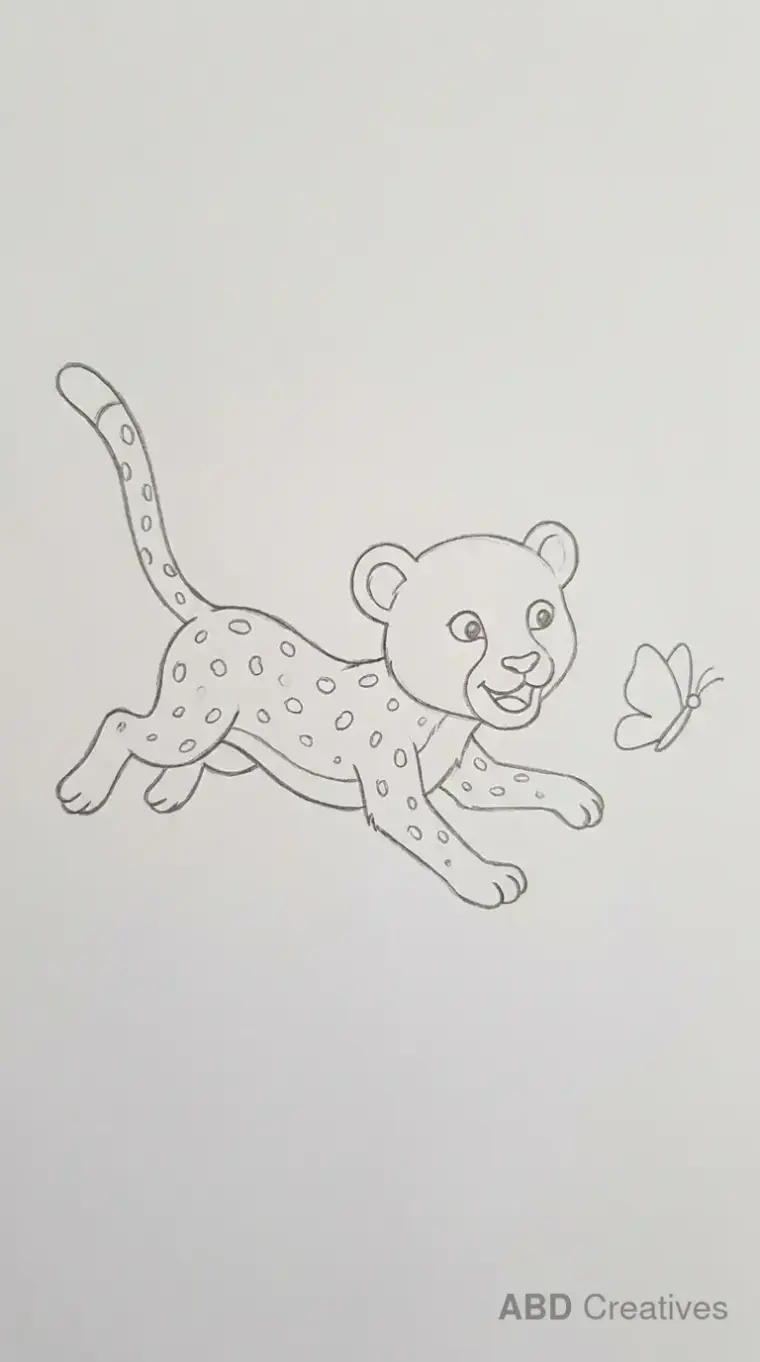 Cheetah Cub Chasing Butterfly