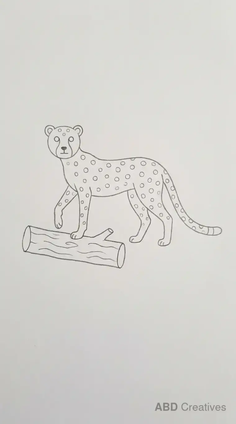 Cheetah Walking Across Log