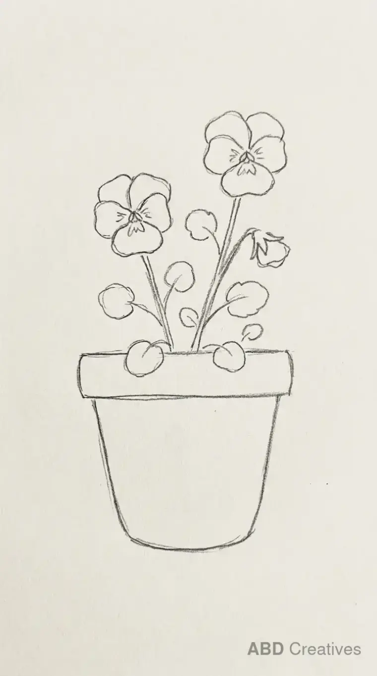 Pansies Growing in a Round Flower Pot